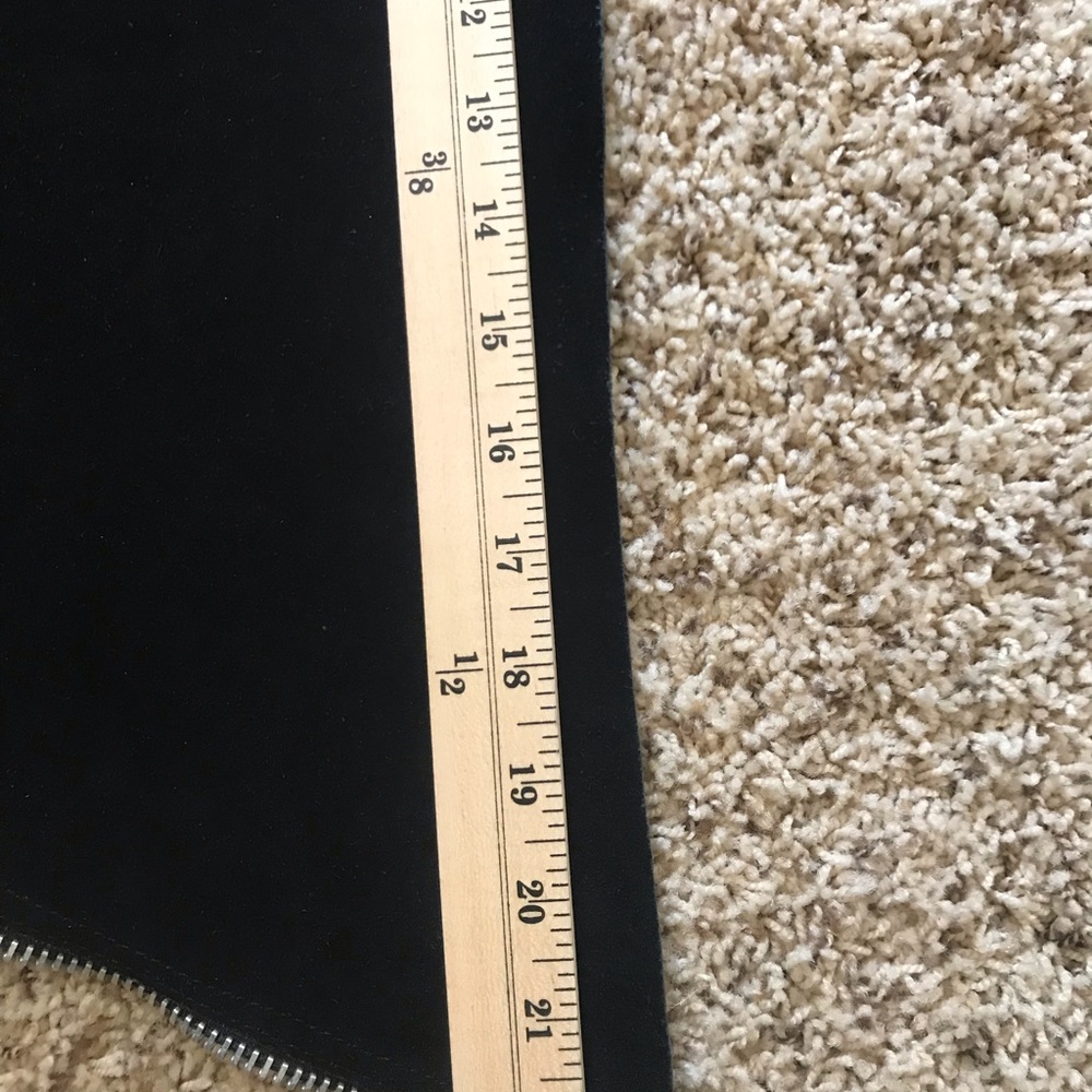 Black rough out equestrian chaps.